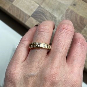 Bezel set emerald faux diamond ring, from show me your mumu.